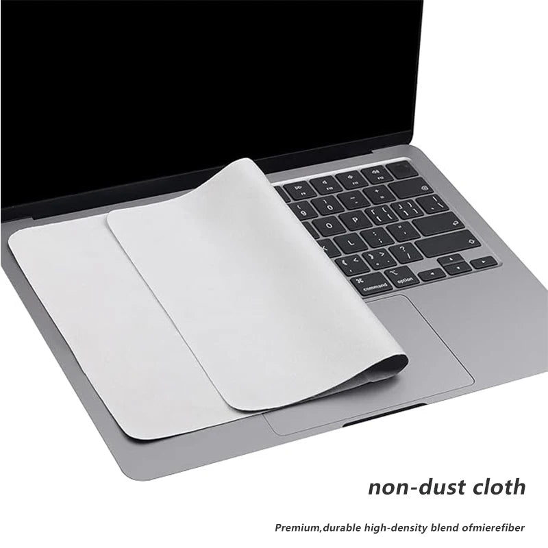 Laptop with a non-dust cloth on the keyboard and trackpad area