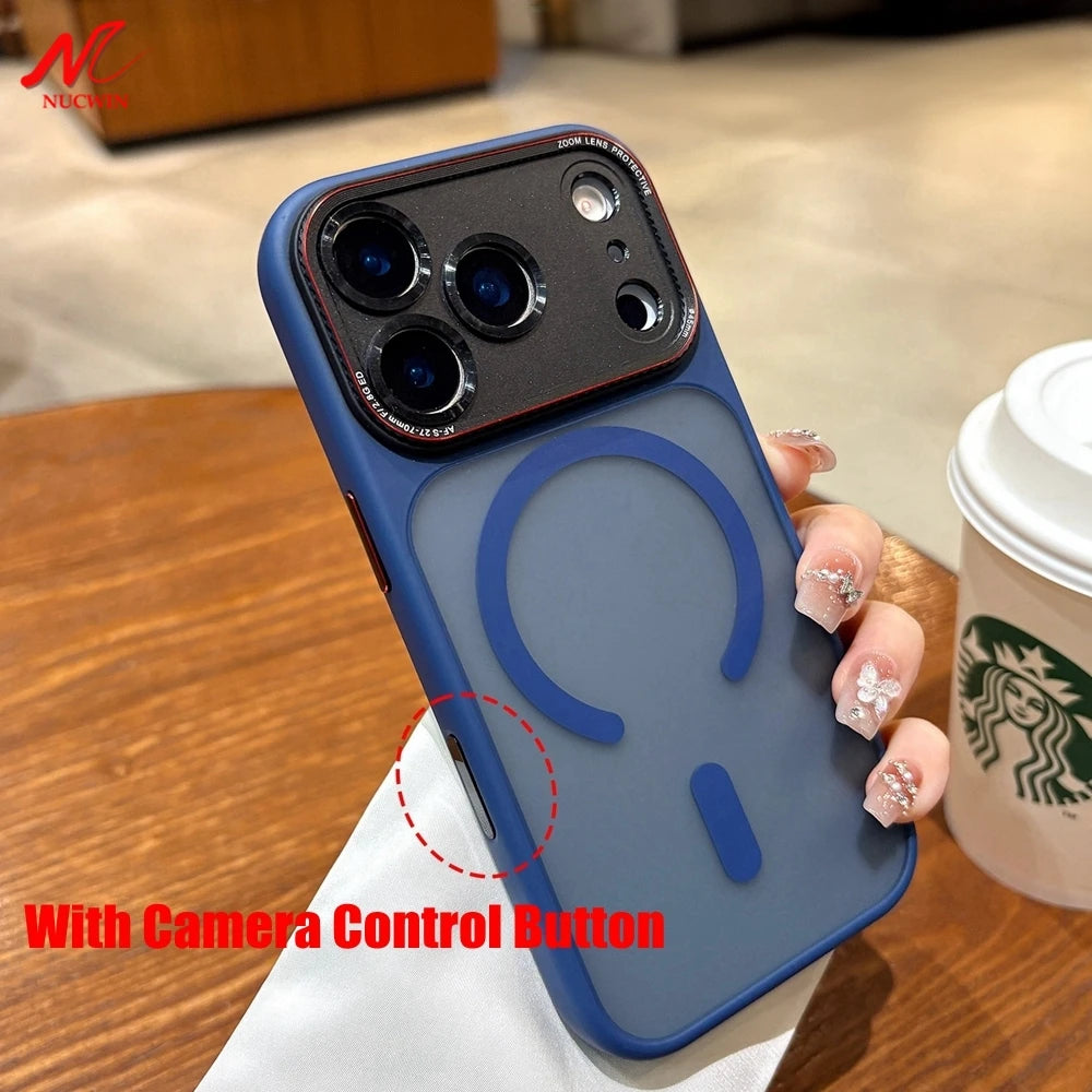 Blue phone case with camera control button held by a hand on a wooden table with a Starbucks cup in the background.